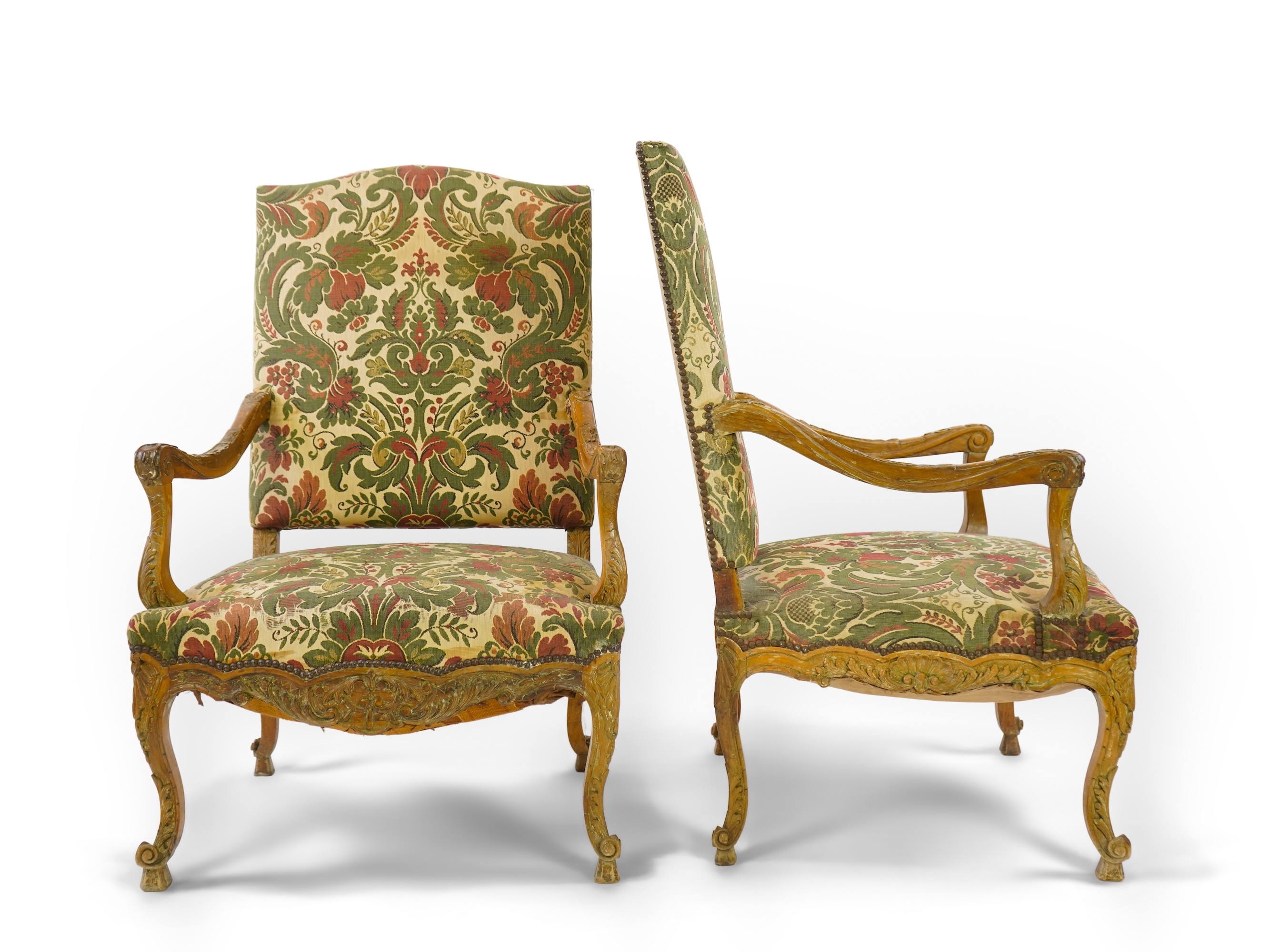 A pair of 19th century Louis XV style carved walnut grand fauteuil